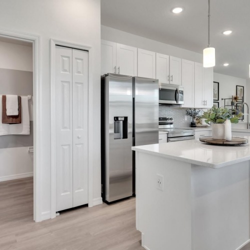 Wide open living areas perfect for entertaining a bathroom next to a kitchen