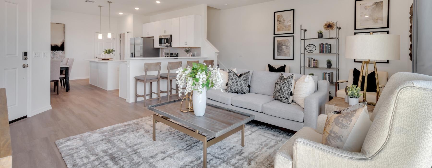 a living room with a couch and a table