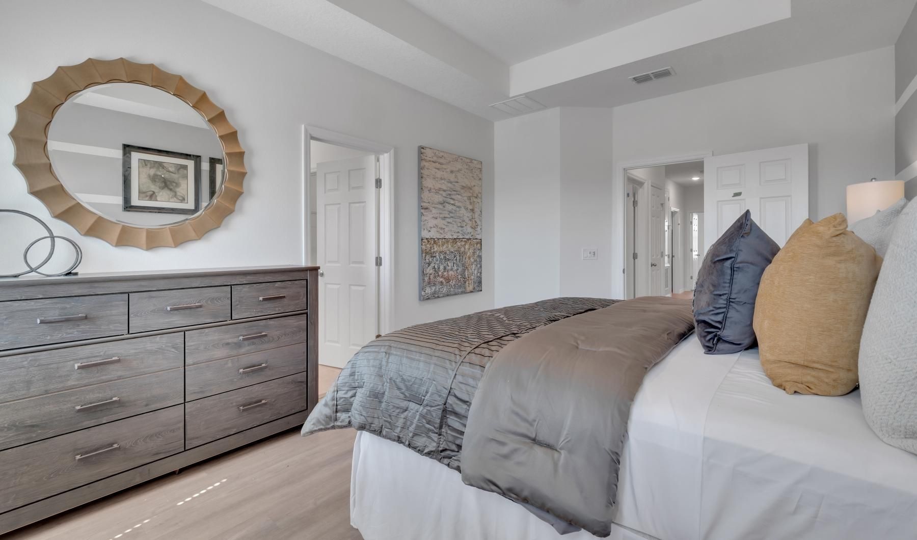Bedroom options to fit every lifestyle a bedroom with a large mirror