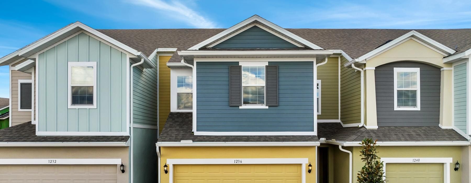 a row of brightly colored homes